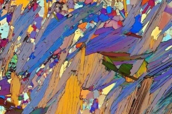 beautiful mineral rocks in microview: Muscovite schist from eastern Alps. The large strip parts in this picture is mica.